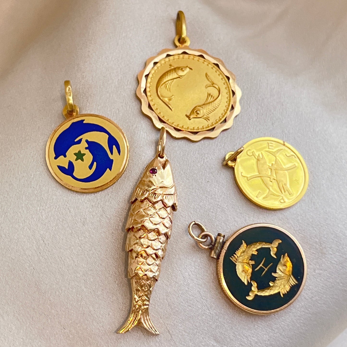 Vintage 14K Yellow Gold Articulated Fish Pendant with Ruby Eyes