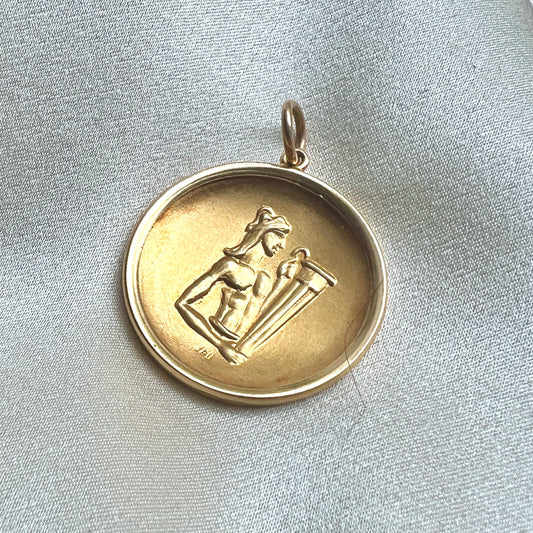 Vintage 18k Yellow Gold Aquarius the Waterbearer Repousse Medallion Pendant