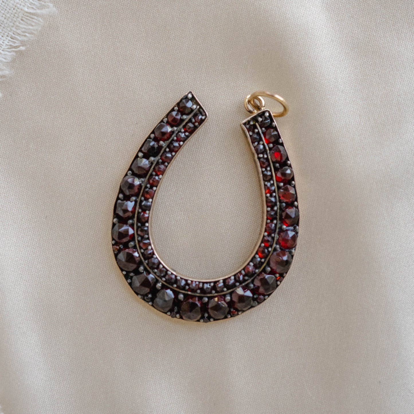 Antique Gilt Bohemian Rosecut Garnet Horseshoe Pendant