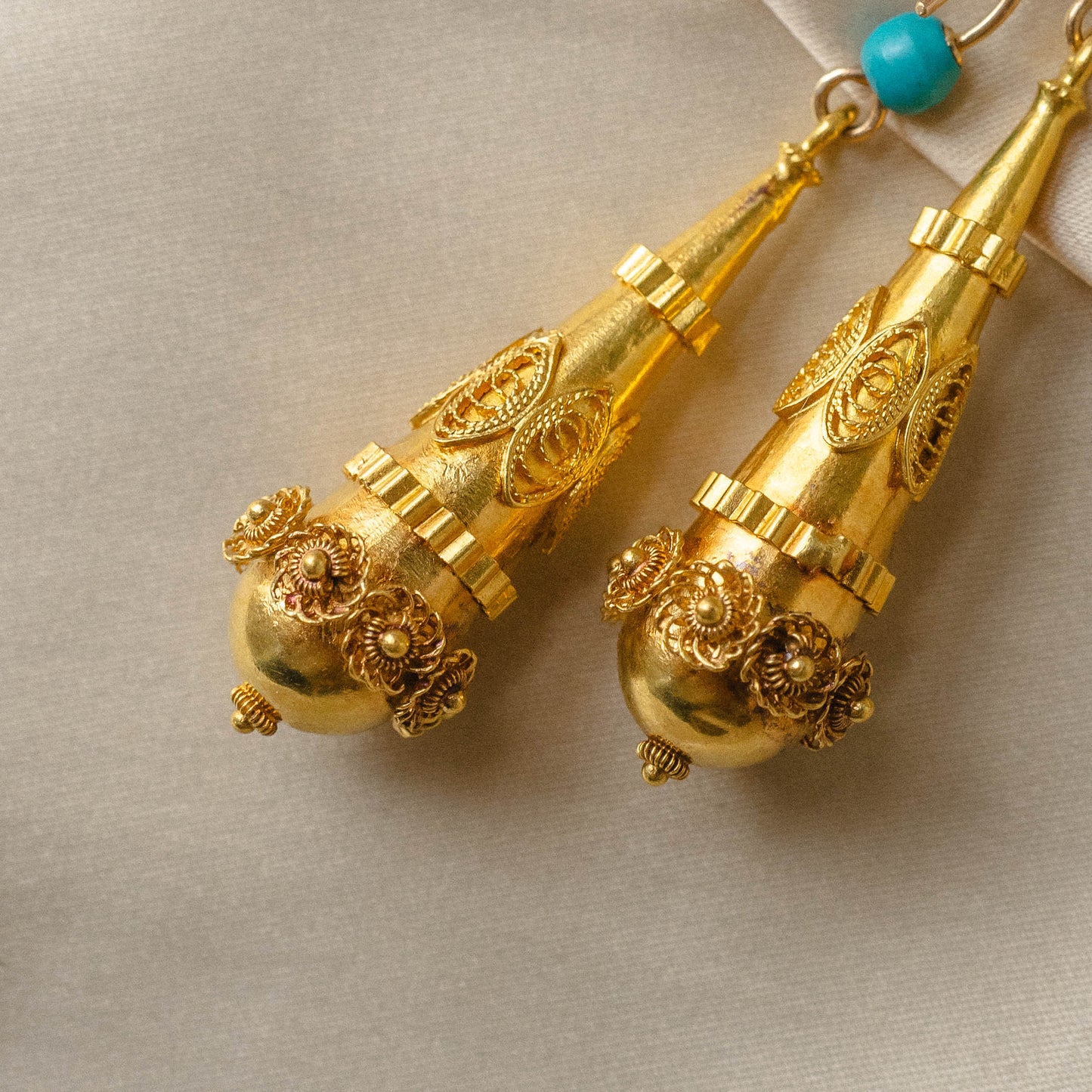 "A Turquoise Touch" Earrings in 18k Torpedo Earrings with Turquoise Accent