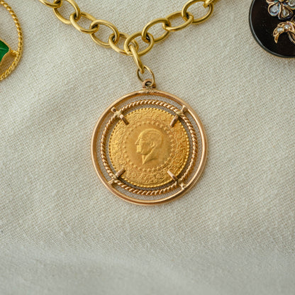 Stunning 22k Turkish coin with 12k rose gold mounting
