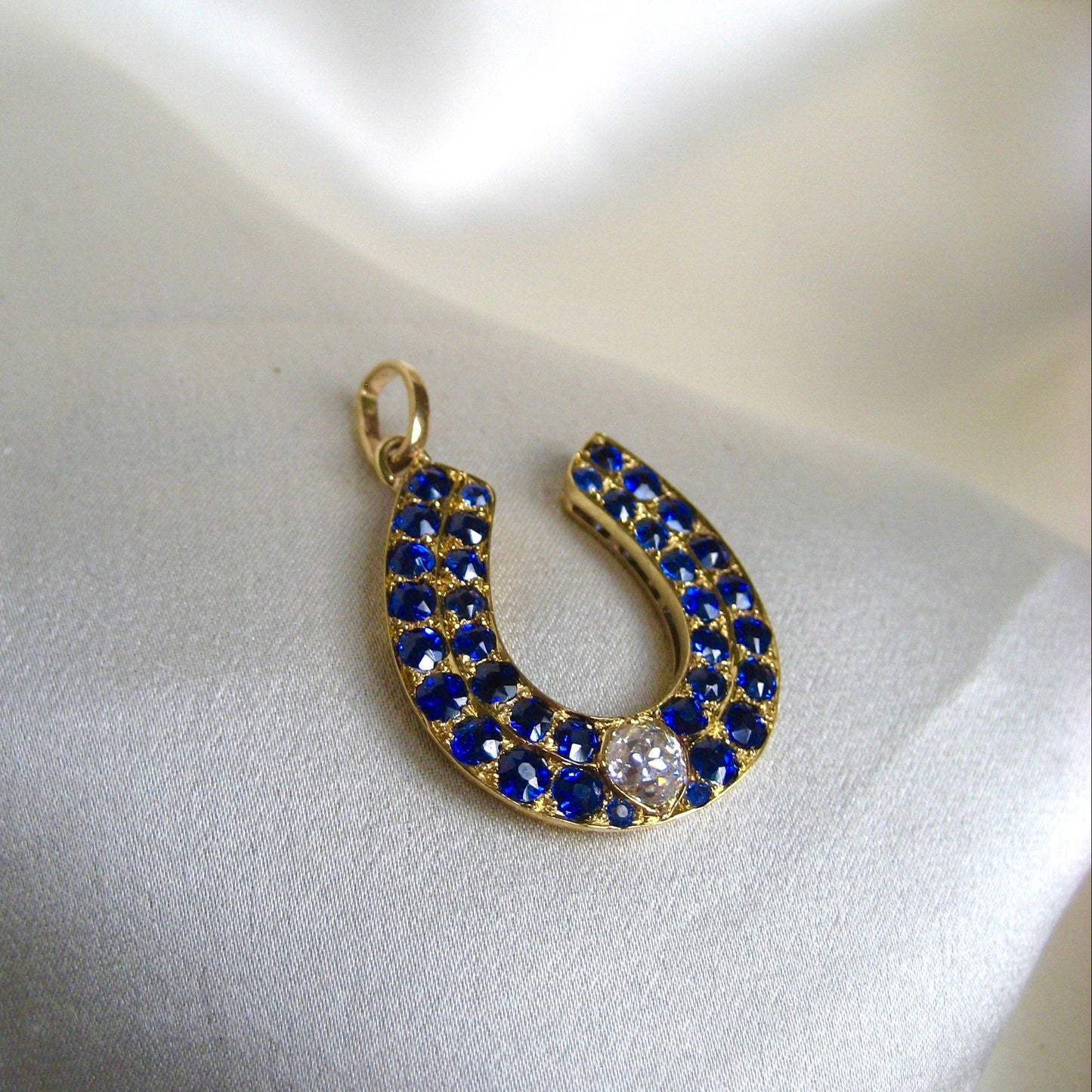 Stunning Sapphire and Diamond Horseshoe Pendant