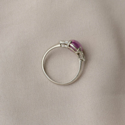 Cabochon Oval Pink Sapphire Platinum Ring with Trillion Cut Diamonds